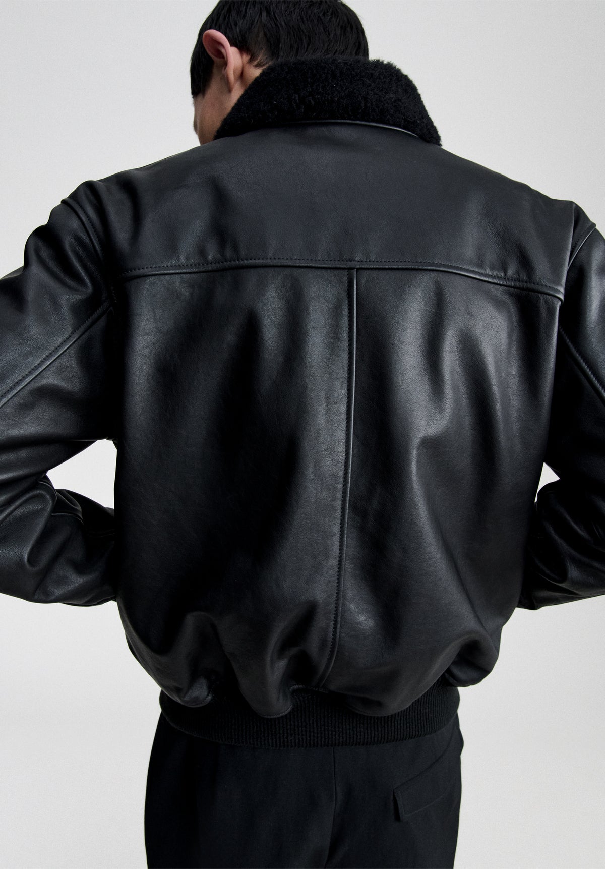 Black leather bomber jacket